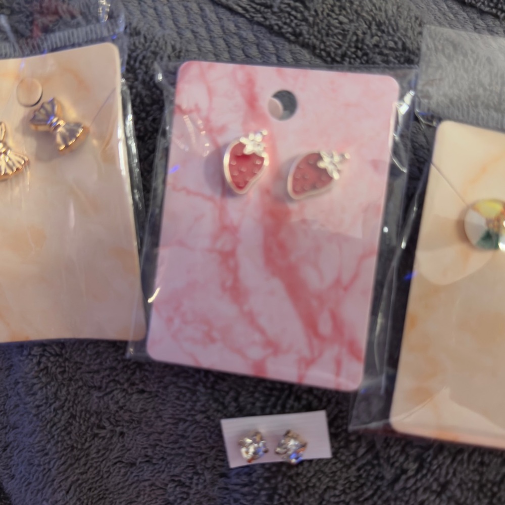 4 pairs of earrings BUNDLE New in pkg. Bows Strawberries zirconium & pin…